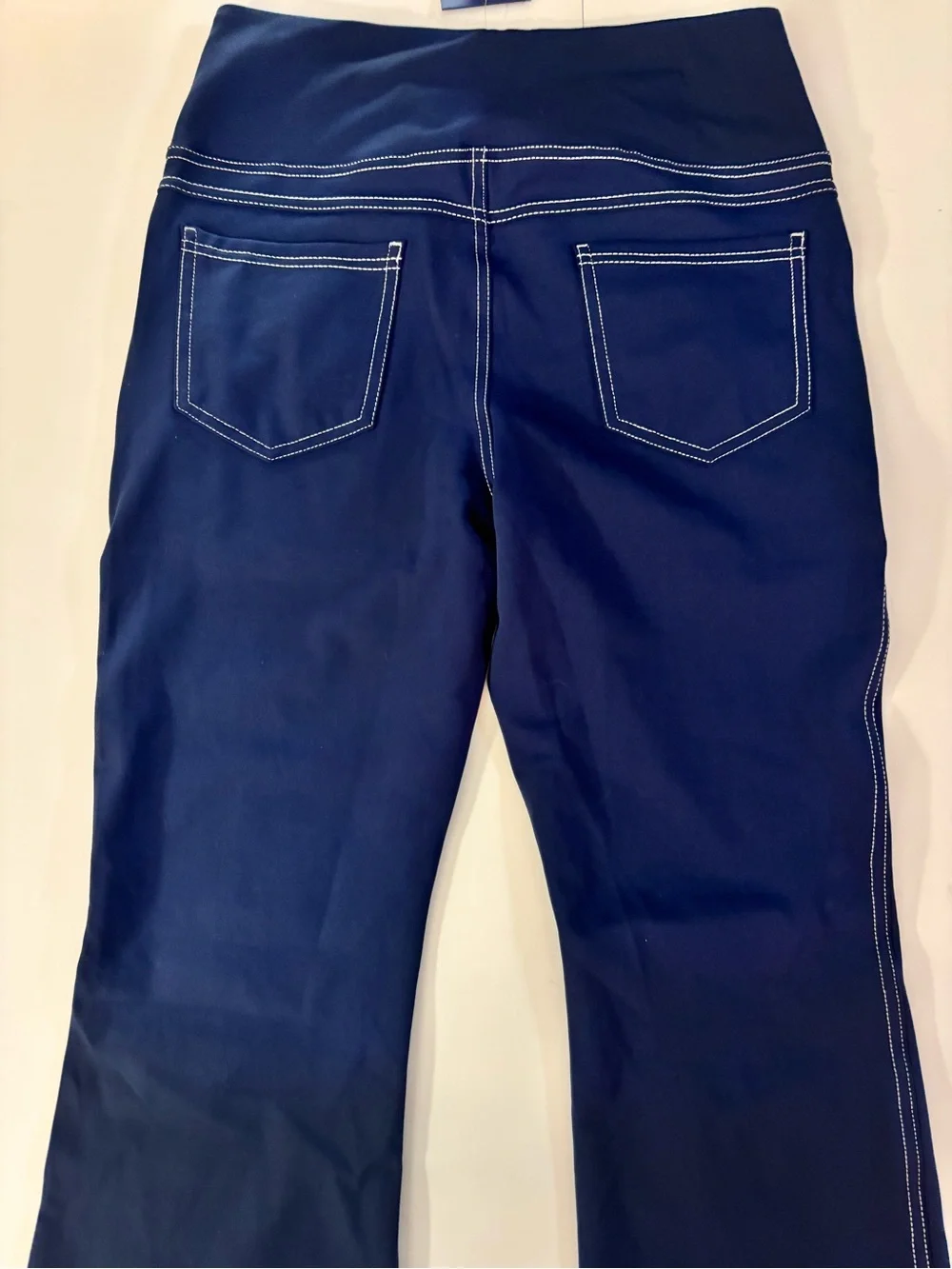 Navy High-Rise Stretch Jeggings with Contrast Stitching.